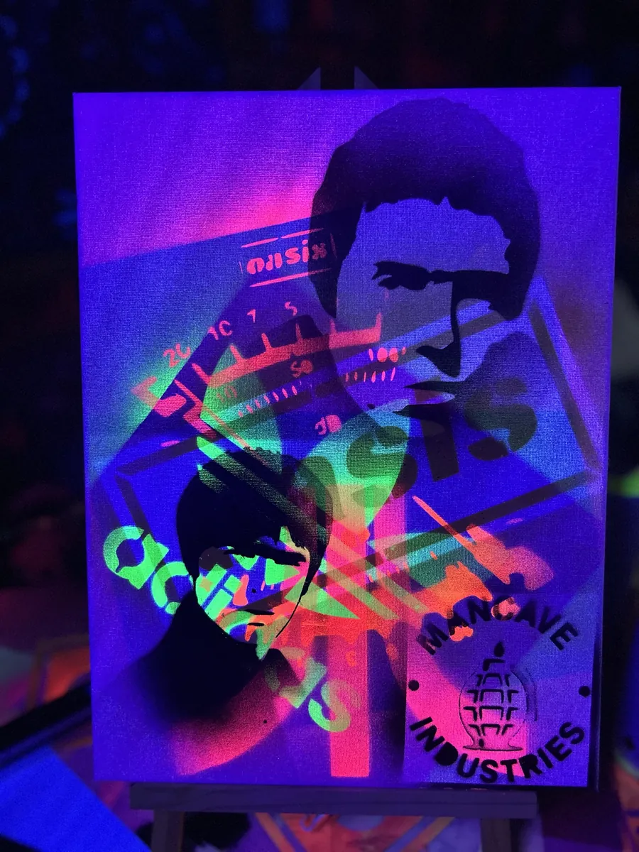 Two stencilled portraits over layered lettering and the seal, under blacklight